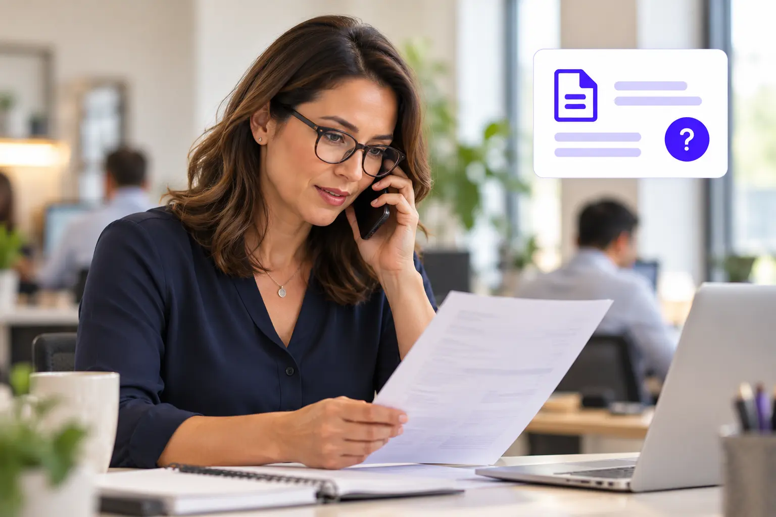 A finance colleague reviewing an invoice during a customer call.